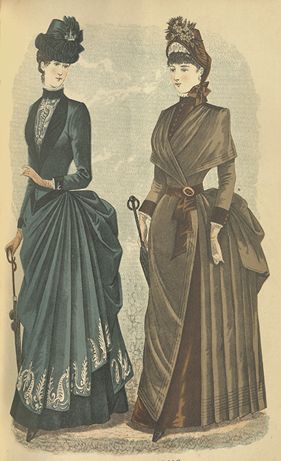 A page from Godey's Lady Book depicting popular fashions of the 1880s. Two women walk alongside eachother, carrying umbrellas. The woman on the left wears dark blue with white detailing at her hem and a dark blue hat. the woman on the right wears an ensemble of browns, with a belt being fastened to her waist and a hat with flowers. 